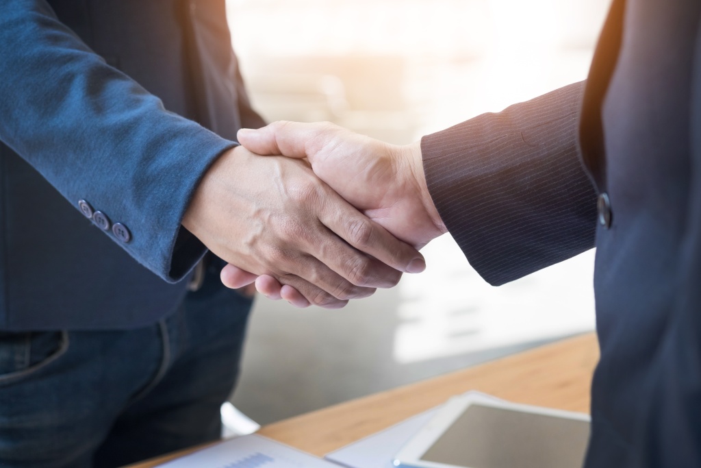 two-confident-business-man-shaking-hands-meeting-office-success-dealing-greeting-partner-concept.jpg two-confident-business-man-shaking-hands-meeting-office-success-dealing-greeting-partner-concept.jpg